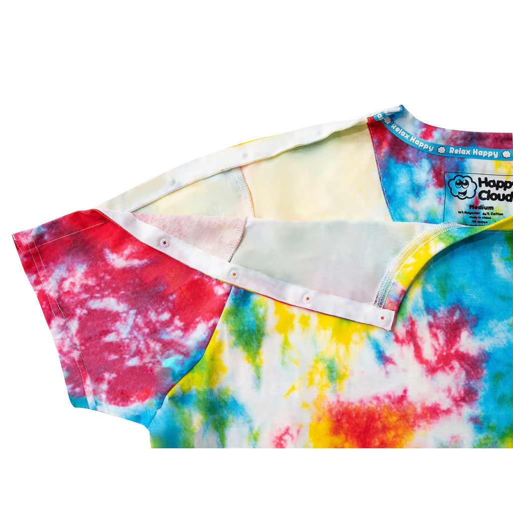Close-up of the Happy Cloud Adaptive tie-dye T-shirt with the shoulder opening unsnapped to show the adaptive snap closure and easy shoulder access.